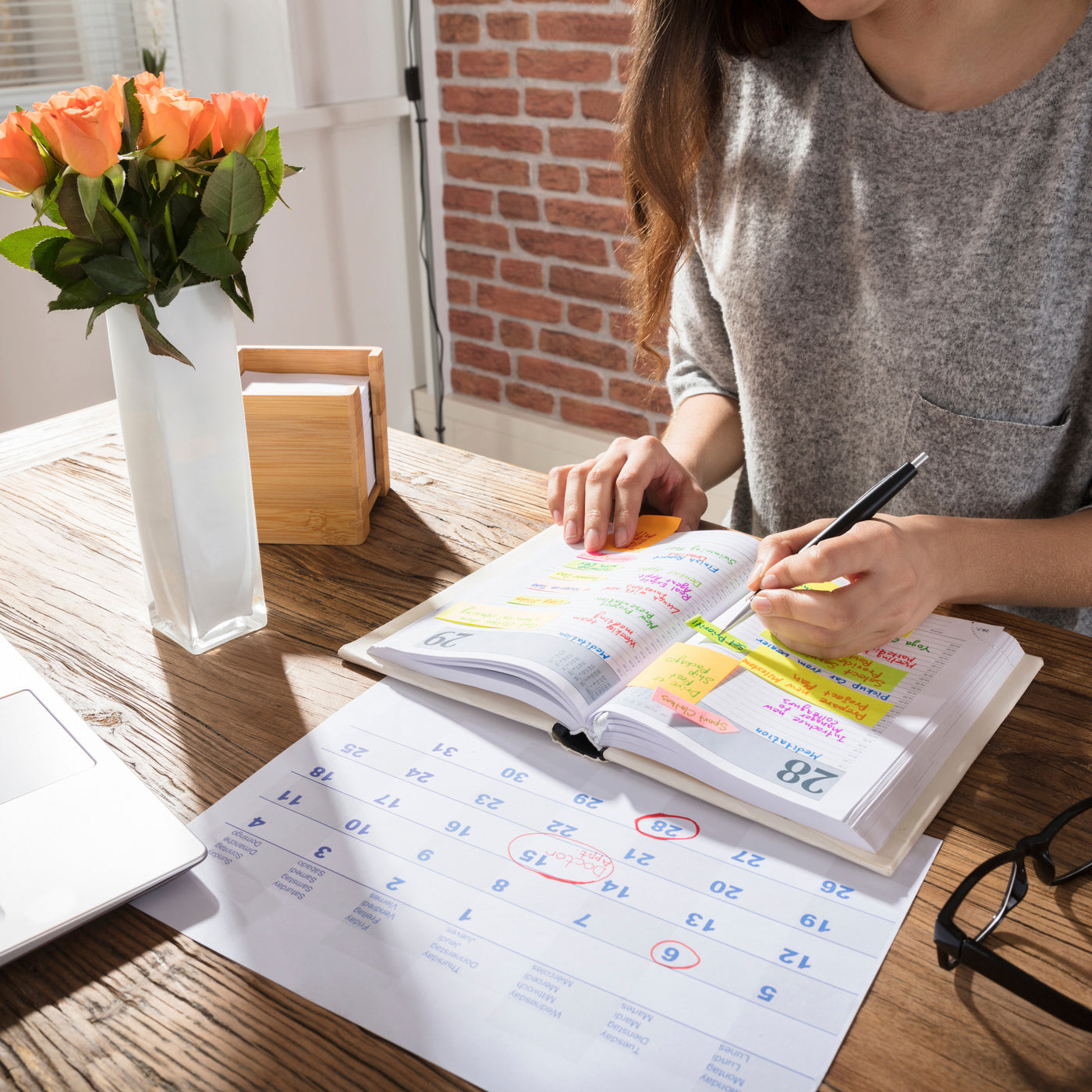 woman looking at planner